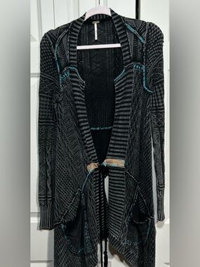 Free People Black Open-Front Long Knit Cardigan Sweater with Teal Accents.